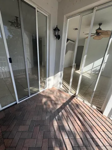 a view of bedroom with a balcony