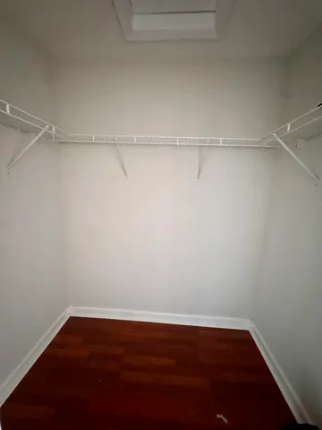 a view of an empty walk in closet
