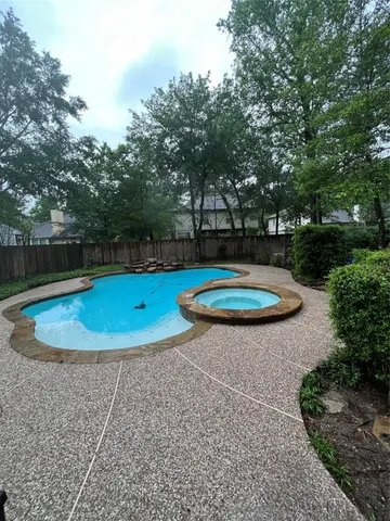 a view of a swimming pool with a slide