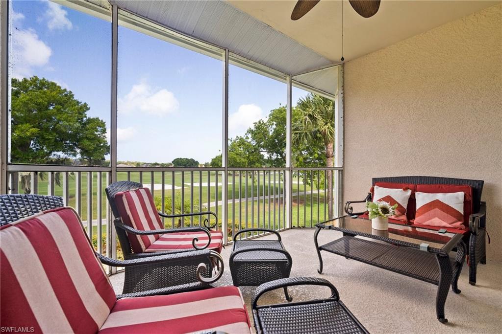 9113 Michael Circle, Unit 4 Naples, FL 34113 - Photo 17 of 23 Sunroom with ceiling fan