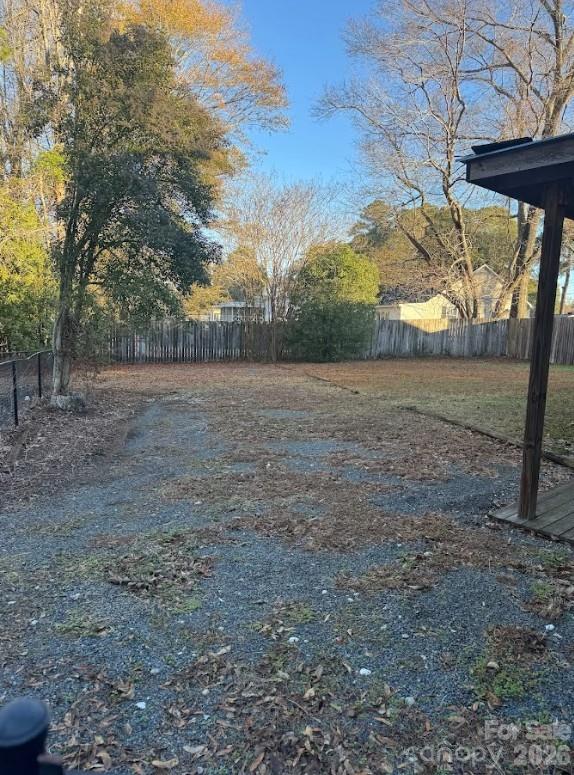 1507 Fayetteville Road Rockingham, NC 28379 - Photo 28 of 28 a view of dirt yard with large trees