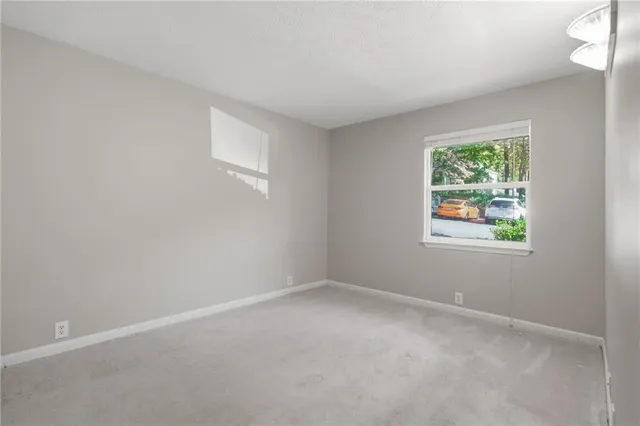 a view of balcony with couches and wooden floor