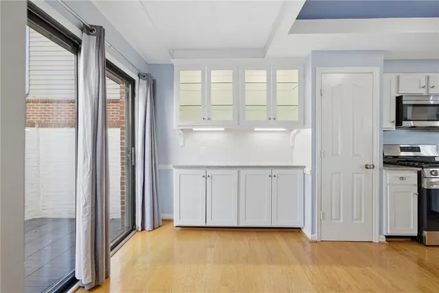 a view of a kitchen with a sink