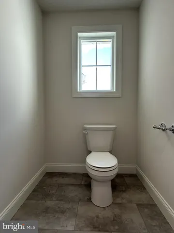 a bathroom with a toilet