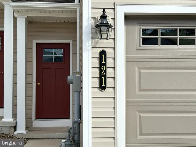 a view of entryway with a front door