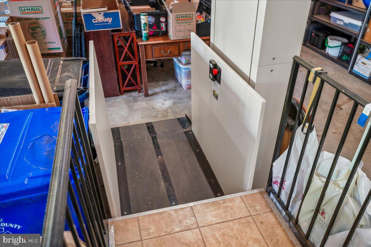 12195 Potomac View Road Newburg, MD 20664 - Photo 68 of 91 5-6 Car Garage Chair Lift
