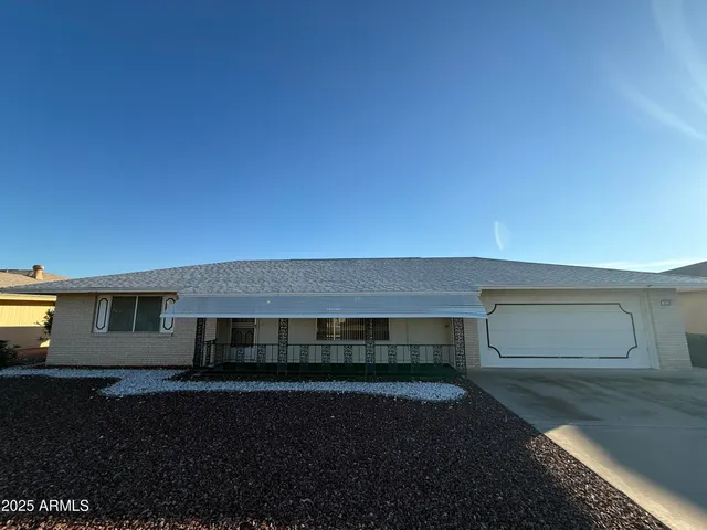 a view of house with outdoor space