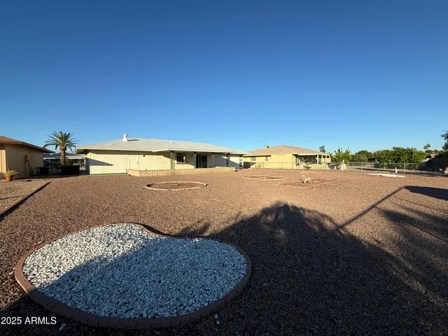 a view of a swimming pool with an outdoor space