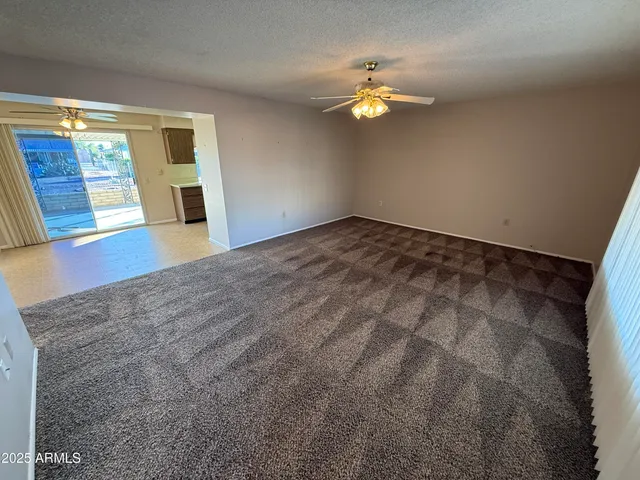 a view of a livingroom with wooden floor