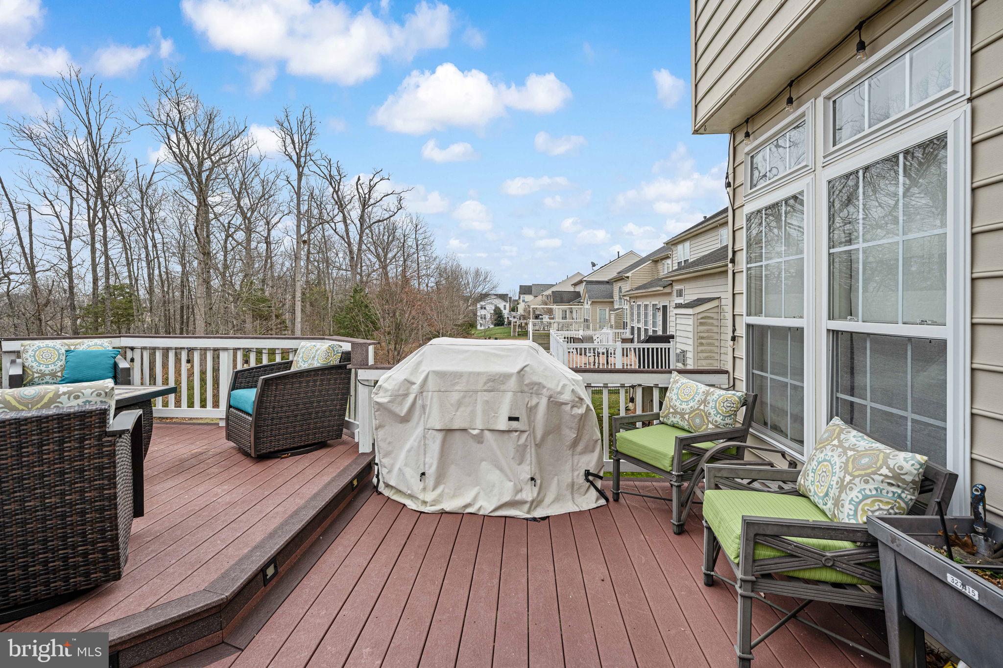 5505 Altenbury Loop Gainesville, VA 20155 - Photo 25 of 62 a view of a roof deck with couches