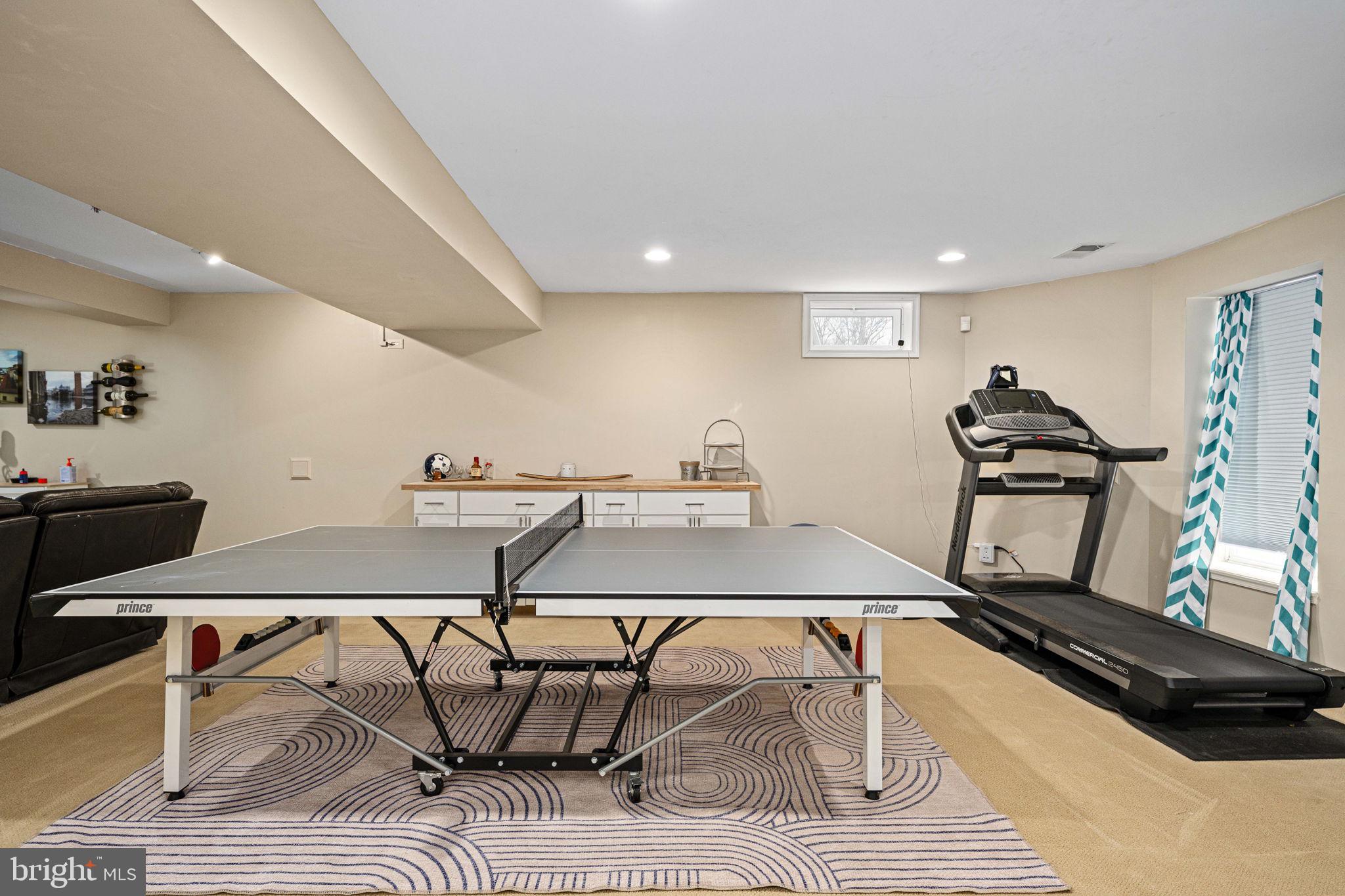 5505 Altenbury Loop Gainesville, VA 20155 - Photo 49 of 62 a room with gym equipment and wooden floor