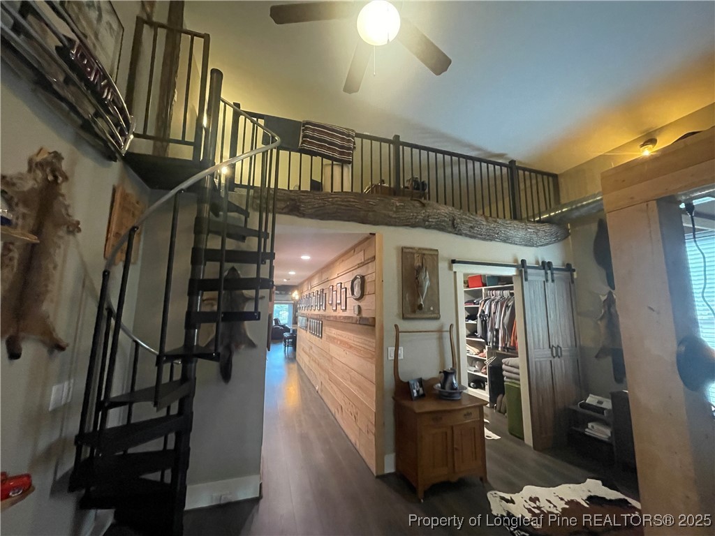 5671 Stewart Road Godwin, NC 28344 - Photo 23 of 34 a view of entryway and hall with wooden floor