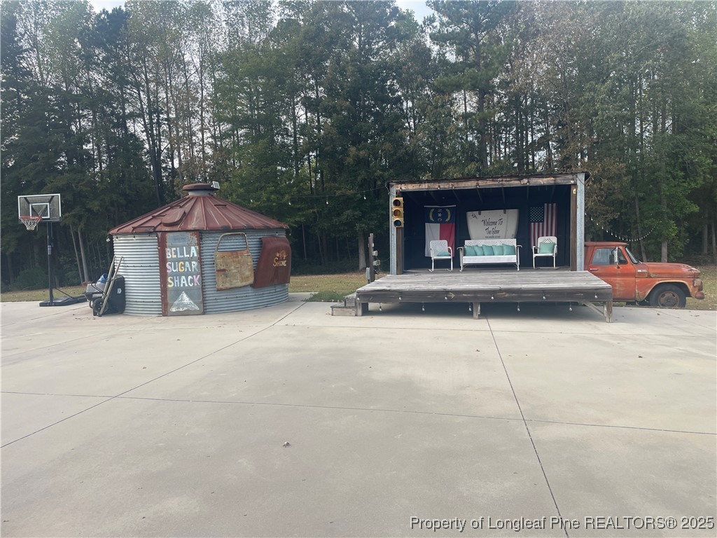 5671 Stewart Road Godwin, NC 28344 - Photo 32 of 34 a house with outdoor space