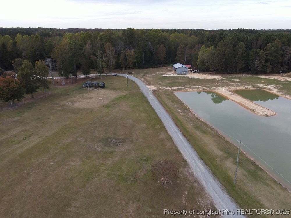 5671 Stewart Road Godwin, NC 28344 - Photo 7 of 34 a view of a backyard