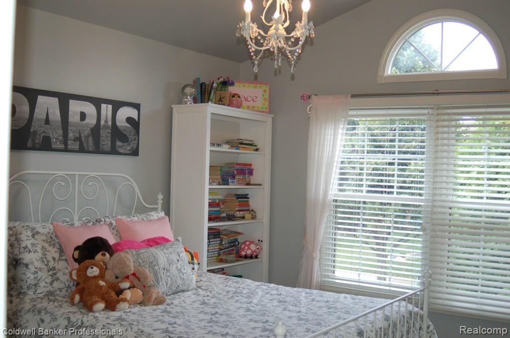 1010 Pointe Pl Boulevard Rochester, MI 48307 - Photo 20 of 33 A room fit for a Princess! Beautiful chandelier and window detail!