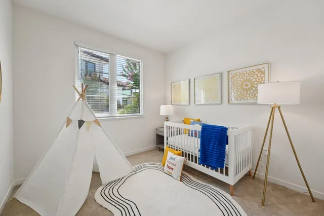 a room with furniture and a window