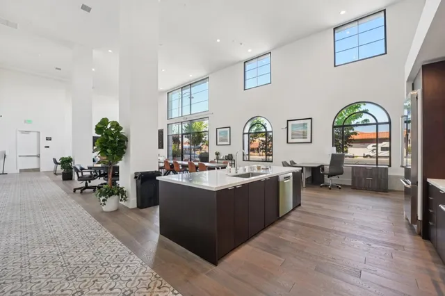 a room with gym equipment and large mirror