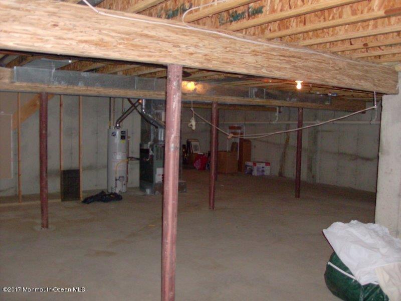 45 Tennyson Road Brick, NJ 08724 - Photo 18 of 23 a view of a room with shelves