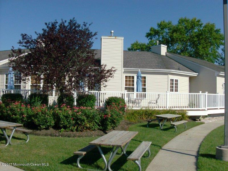 45 Tennyson Road Brick, NJ 08724 - Photo 22 of 23 a view of a house with a backyard and sitting area