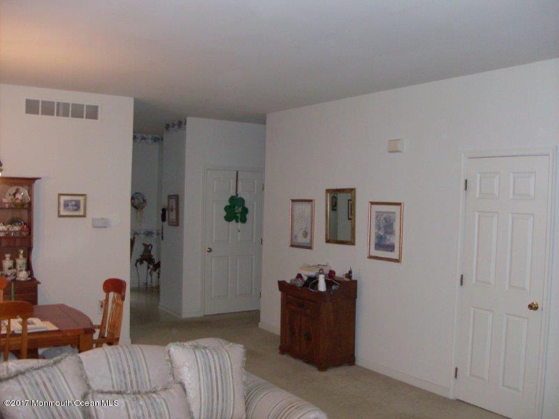 45 Tennyson Road Brick, NJ 08724 - Photo 5 of 23 a bedroom with a bed and a couch