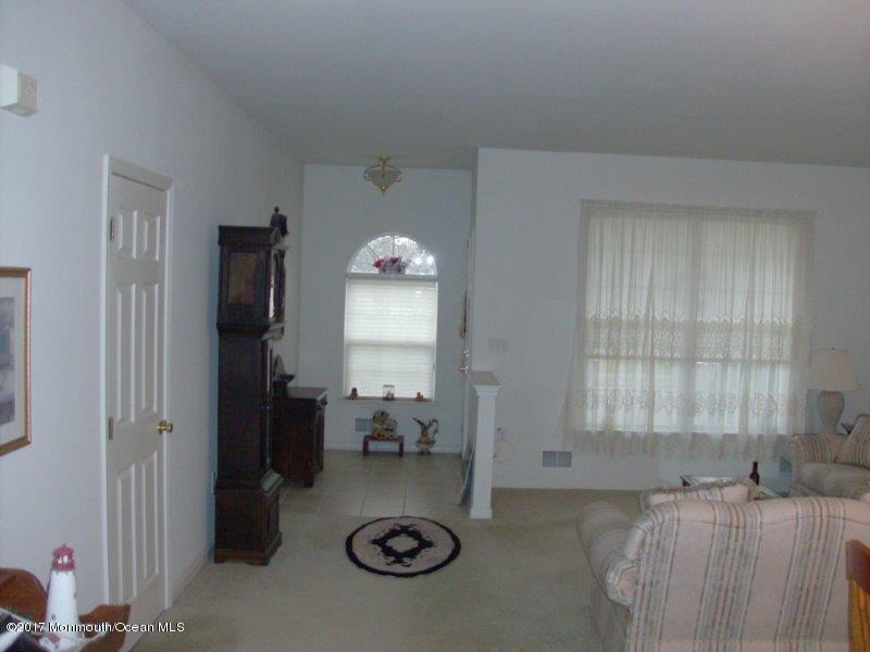 45 Tennyson Road Brick, NJ 08724 - Photo 7 of 23 a room with a bed furniture and a window