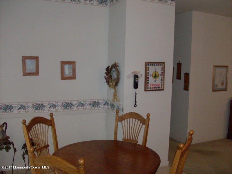 45 Tennyson Road Brick, NJ 08724 - Photo 10 of 23 a view of a porch with furniture and wooden floor