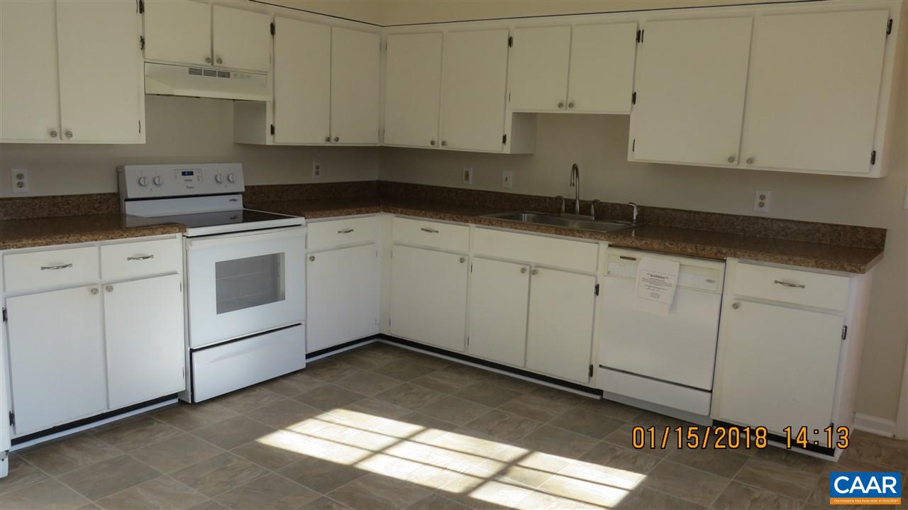 9 Xebec Road Palmyra, VA 22963 - Photo 3 of 13 a kitchen with granite countertop white cabinets and white appliances