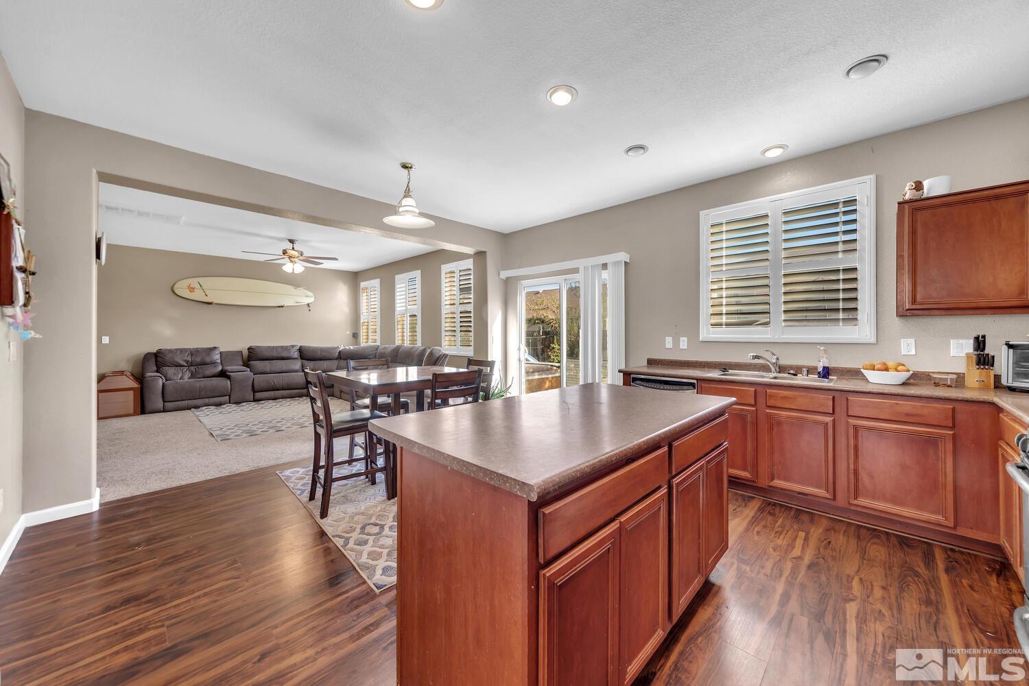 8970 Sorcha Street Reno, NV 89506 - Photo 11 of 38 a kitchen with counter top space and sink