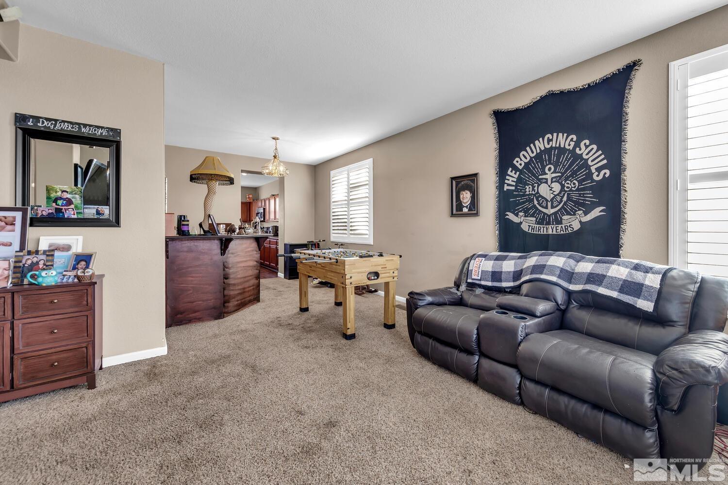 8970 Sorcha Street Reno, NV 89506 - Photo 15 of 38 a living room with furniture and a window