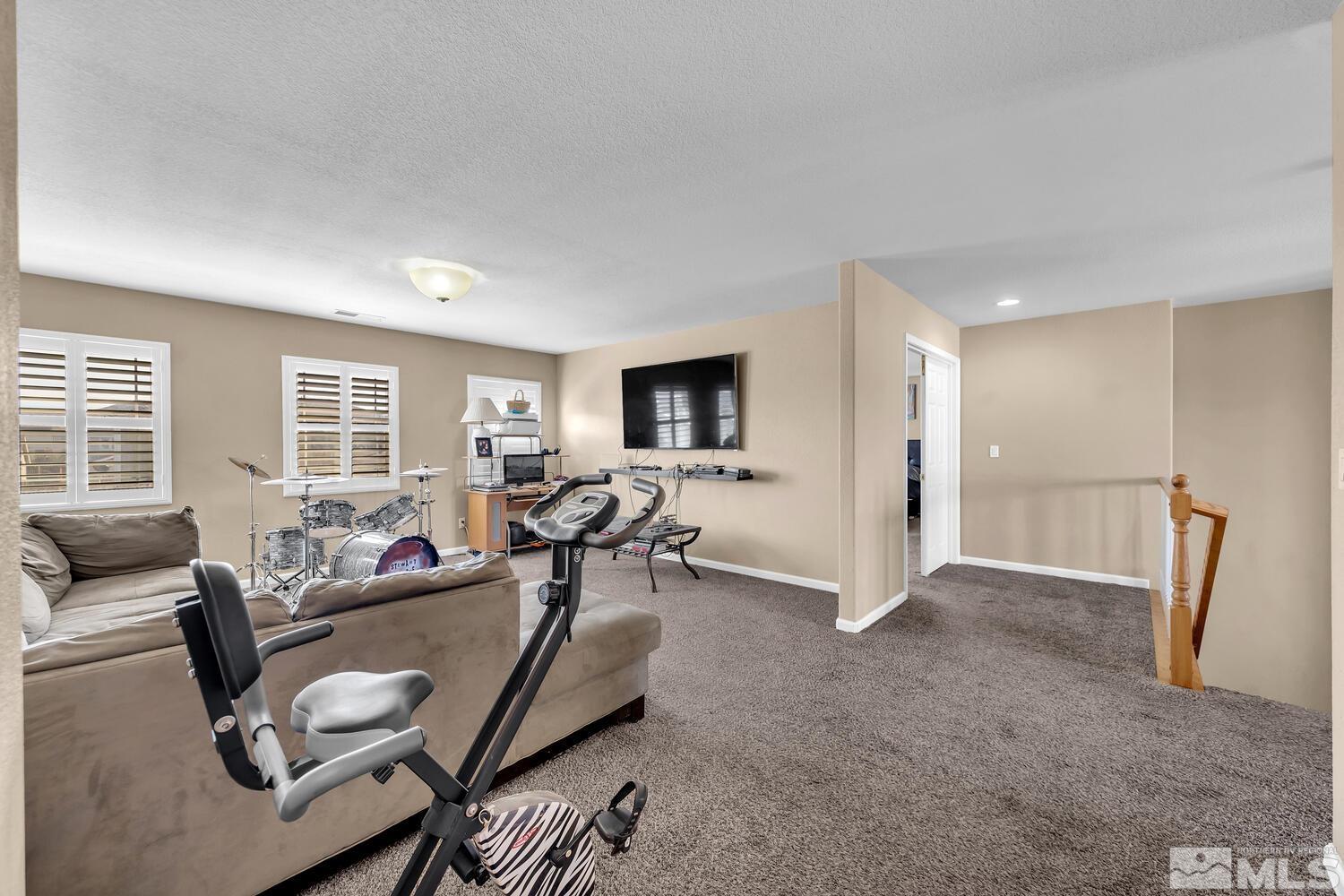8970 Sorcha Street Reno, NV 89506 - Photo 20 of 38 a living room with furniture