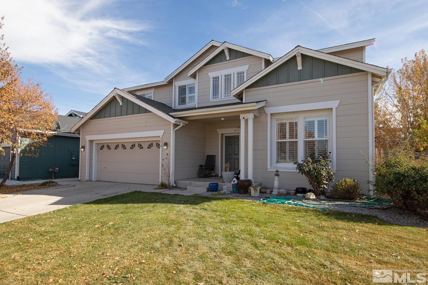 8970 Sorcha Street Reno, NV 89506 - Photo 2 of 38 a view of a house with yard and plants