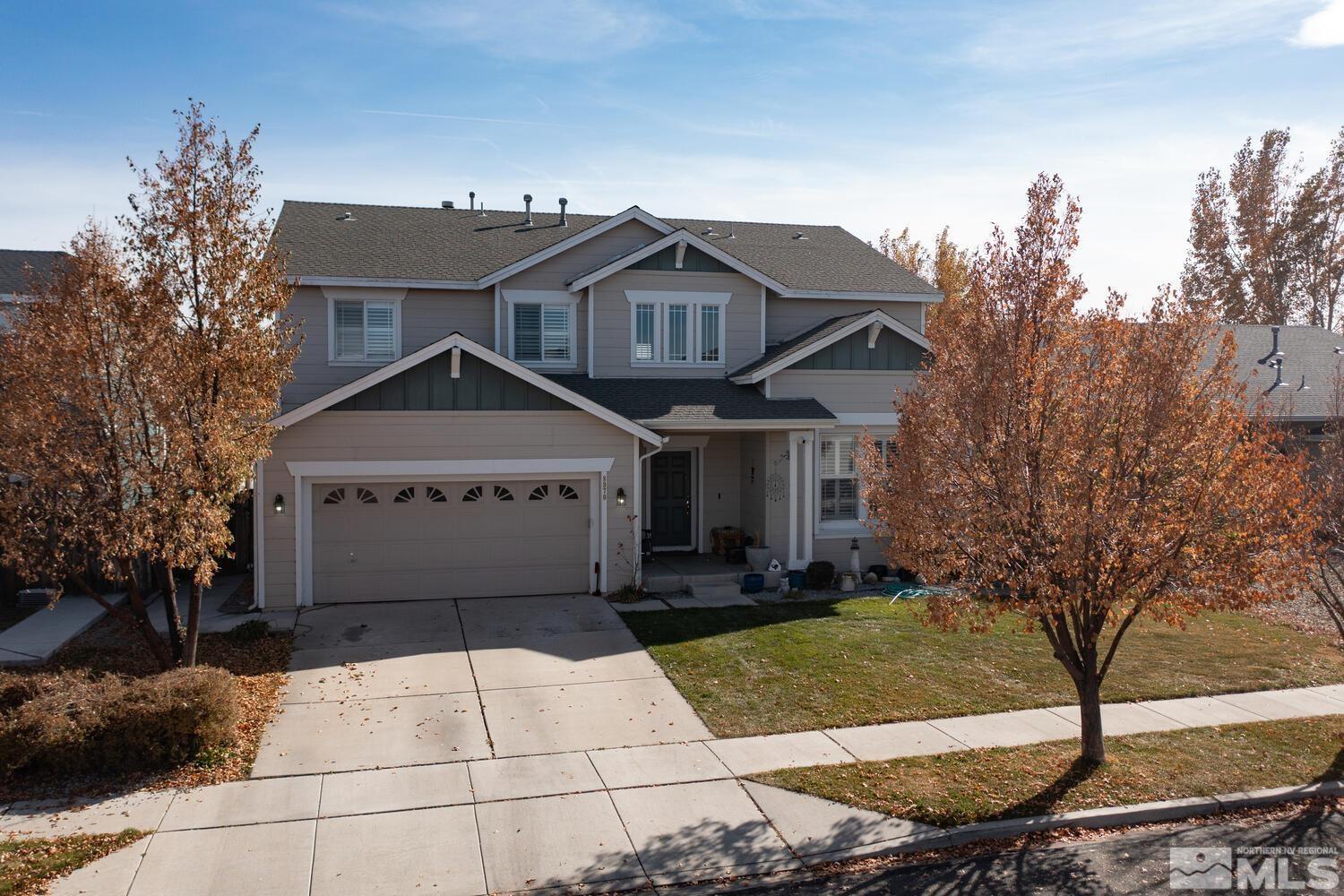 8970 Sorcha Street Reno, NV 89506 - Photo 32 of 38 a view of a house with a yard