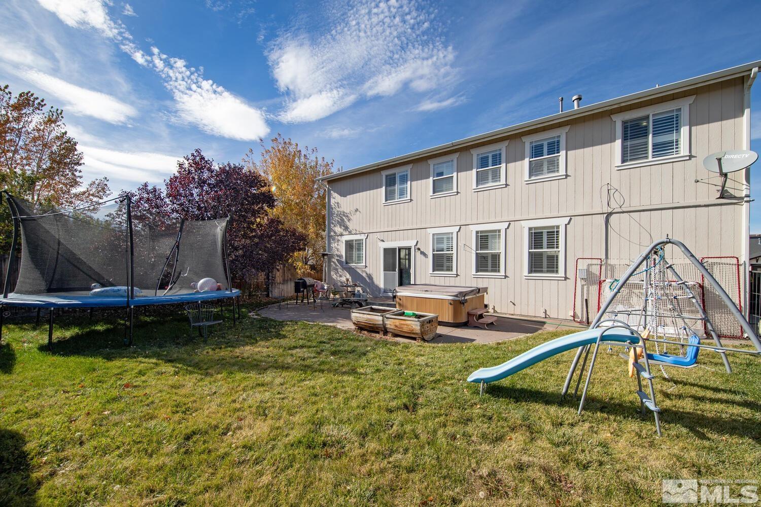 8970 Sorcha Street Reno, NV 89506 - Photo 36 of 38 a view of a house with swimming pool and sitting area