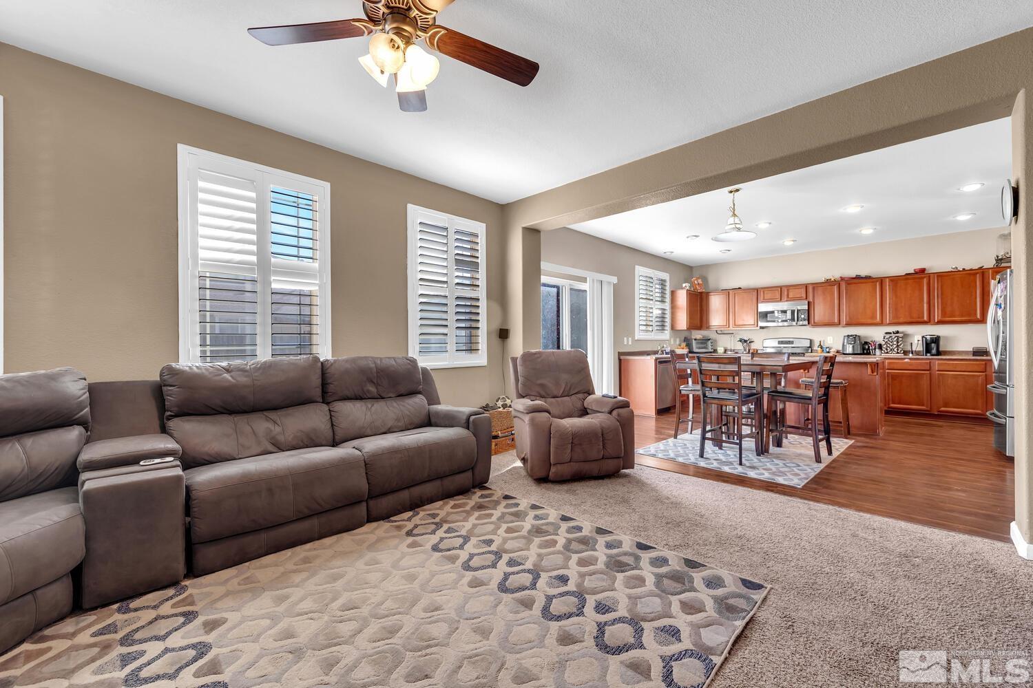 8970 Sorcha Street Reno, NV 89506 - Photo 5 of 38 a living room with furniture and a large window