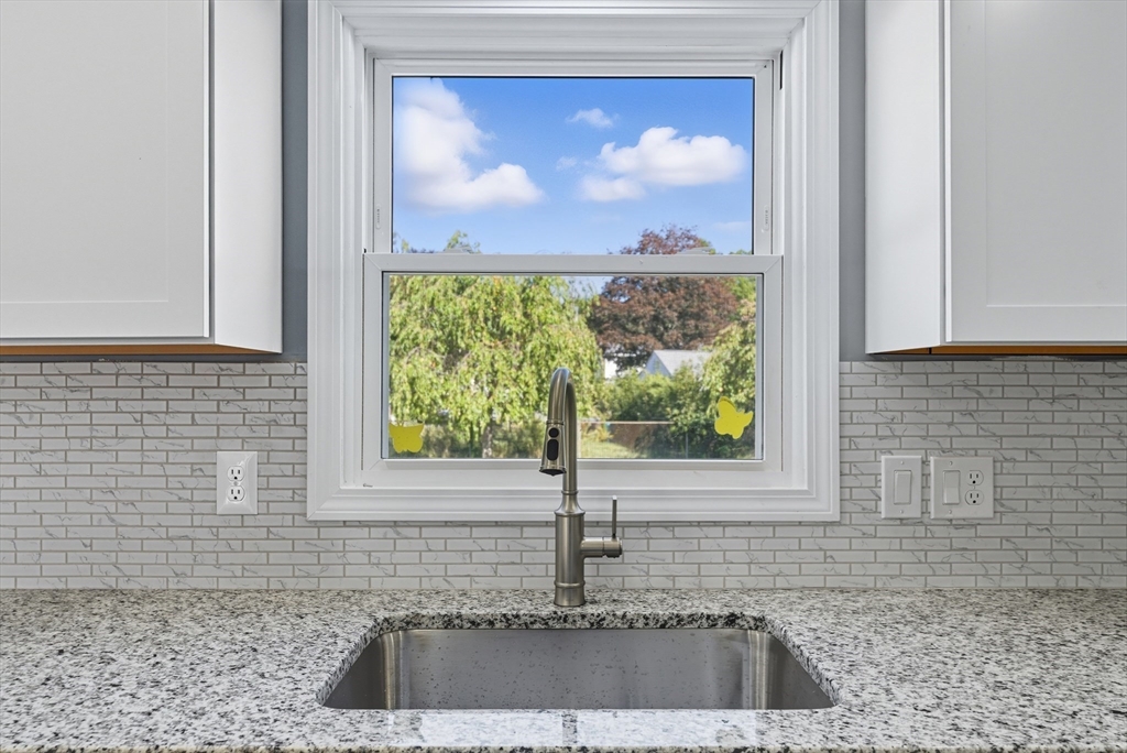 87 Prokop Avenue Ludlow, MA 01056 - Photo 16 of 40 a kitchen with a sink and a window