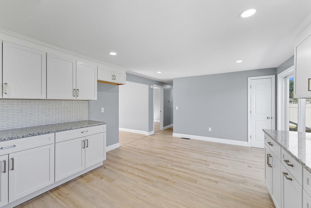 87 Prokop Avenue Ludlow, MA 01056 - Photo 17 of 40 a view of an empty room with wooden floor
