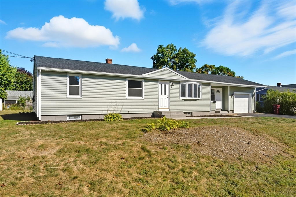 87 Prokop Avenue Ludlow, MA 01056 - Photo 2 of 40 a house with yard in front of it