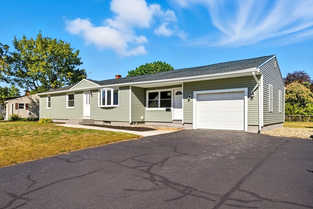 87 Prokop Avenue Ludlow, MA 01056 - Photo 3 of 40 a view of a house with pool and a yard