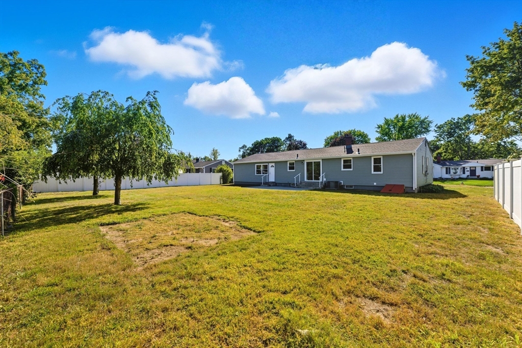87 Prokop Avenue Ludlow, MA 01056 - Photo 37 of 40 a house view with swimming pool in front of it