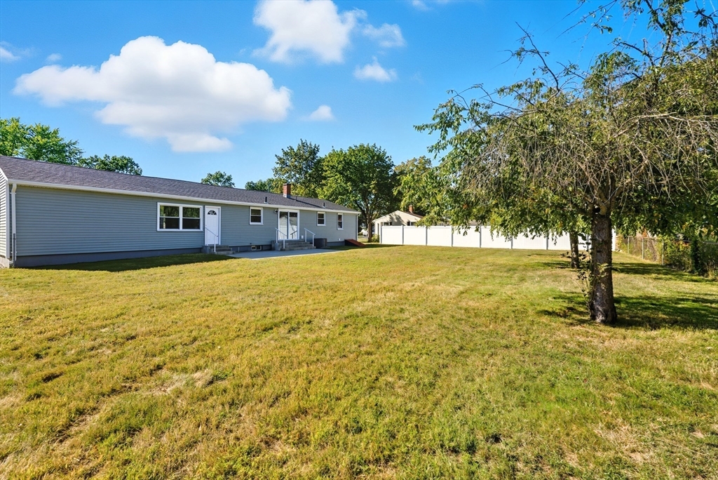 87 Prokop Avenue Ludlow, MA 01056 - Photo 38 of 40 a view of an ocean of house with yard and trees