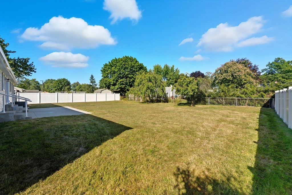 87 Prokop Avenue Ludlow, MA 01056 - Photo 40 of 40 a view of yard with swimming pool and green space