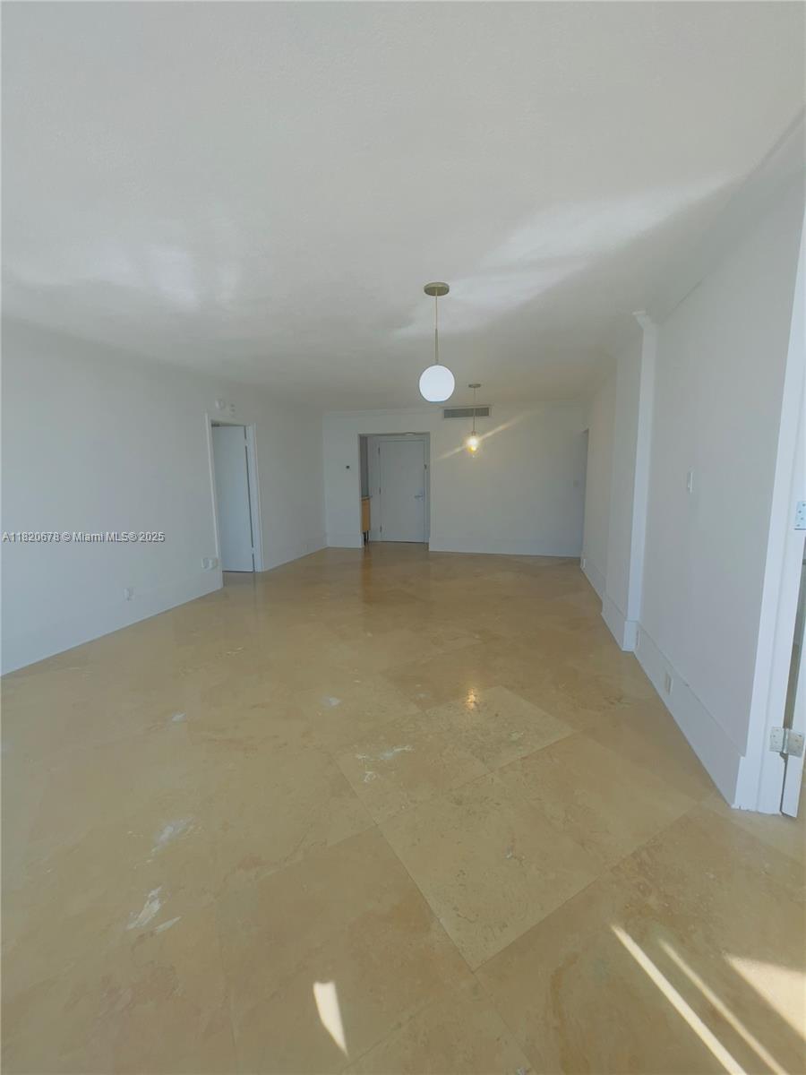 780 Northeast 69th Street, Unit 1507 Miami, FL 33138 - Photo 9 of 23 a view of empty room