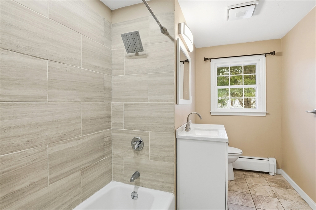 36 Hillandale Road Ashburnham, MA 01430 - Photo 11 of 31 a bathroom with a sink a toilet and shower