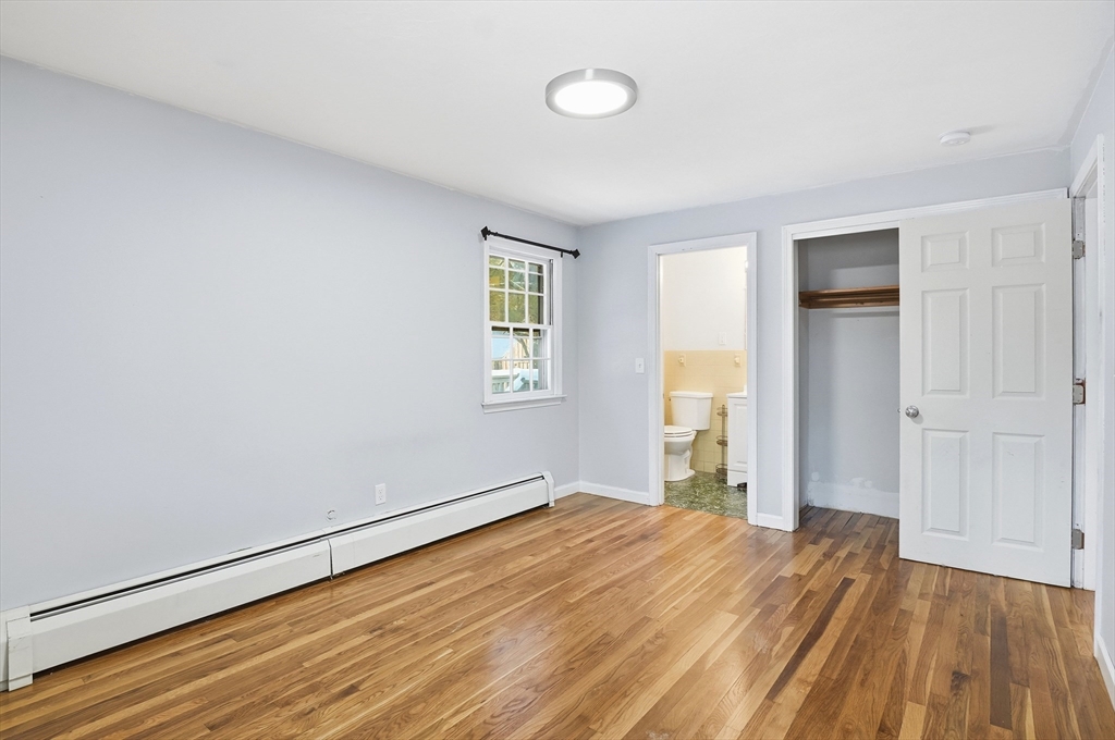 36 Hillandale Road Ashburnham, MA 01430 - Photo 18 of 31 an empty room with a window and wooden floor