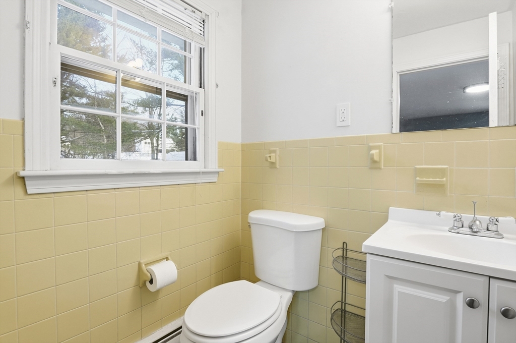 36 Hillandale Road Ashburnham, MA 01430 - Photo 19 of 31 a white toilet sitting next to a bathroom sink