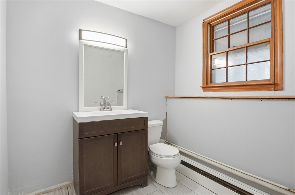36 Hillandale Road Ashburnham, MA 01430 - Photo 20 of 31 a bathroom with a sink a toilet and a window