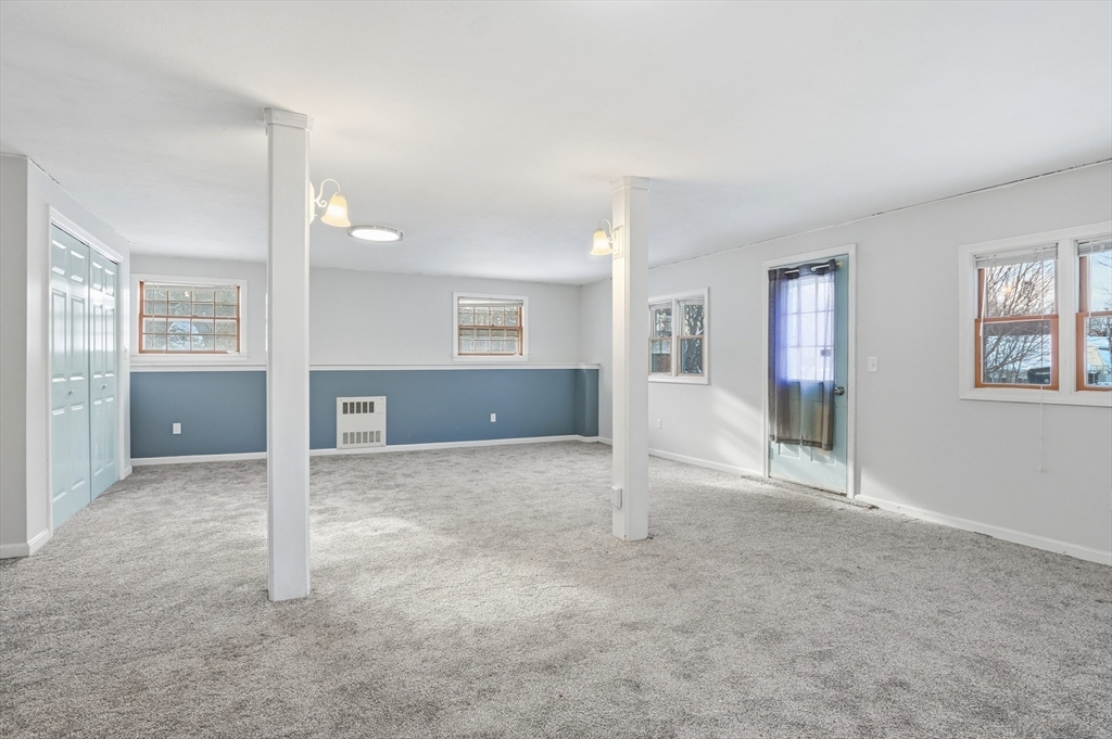 36 Hillandale Road Ashburnham, MA 01430 - Photo 23 of 31 an empty room with windows and entrance