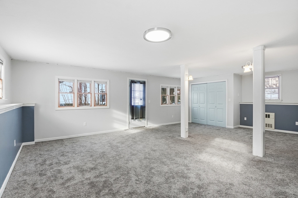 36 Hillandale Road Ashburnham, MA 01430 - Photo 24 of 31 a view of empty room with wooden floor and window