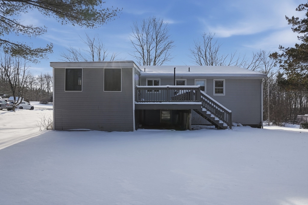 36 Hillandale Road Ashburnham, MA 01430 - Photo 26 of 31 a view of a house with a snow in the yard