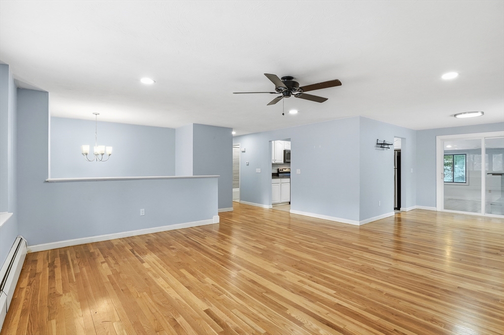 36 Hillandale Road Ashburnham, MA 01430 - Photo 4 of 31 a view of empty room with wooden floor and fan